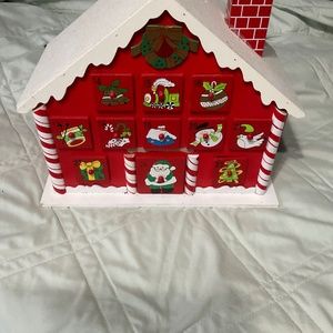 Wood count down to Christmas house.  H159